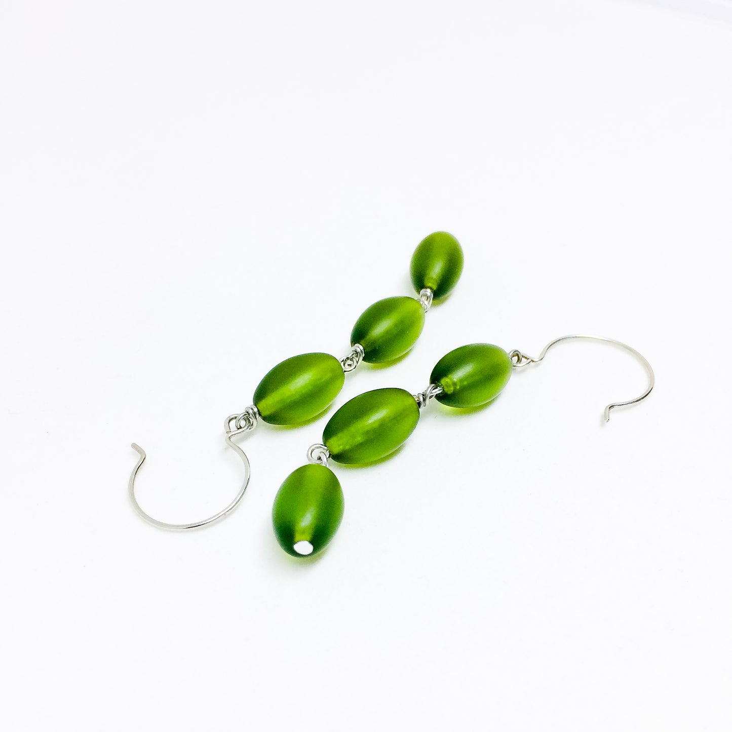 Frosted Czech glass bead drop earrings in green frost