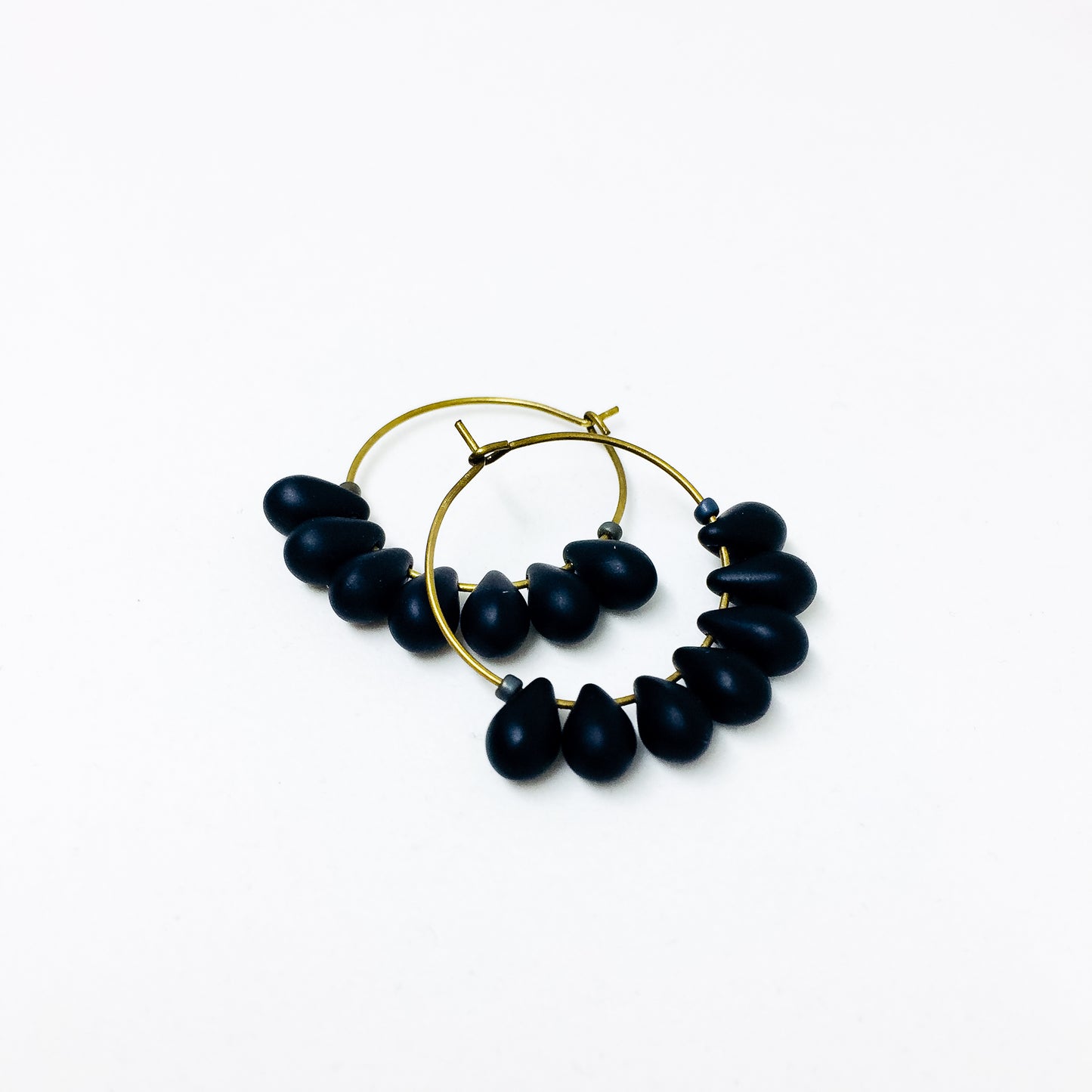 Dewdrop beaded glass hoop earrings in jet black