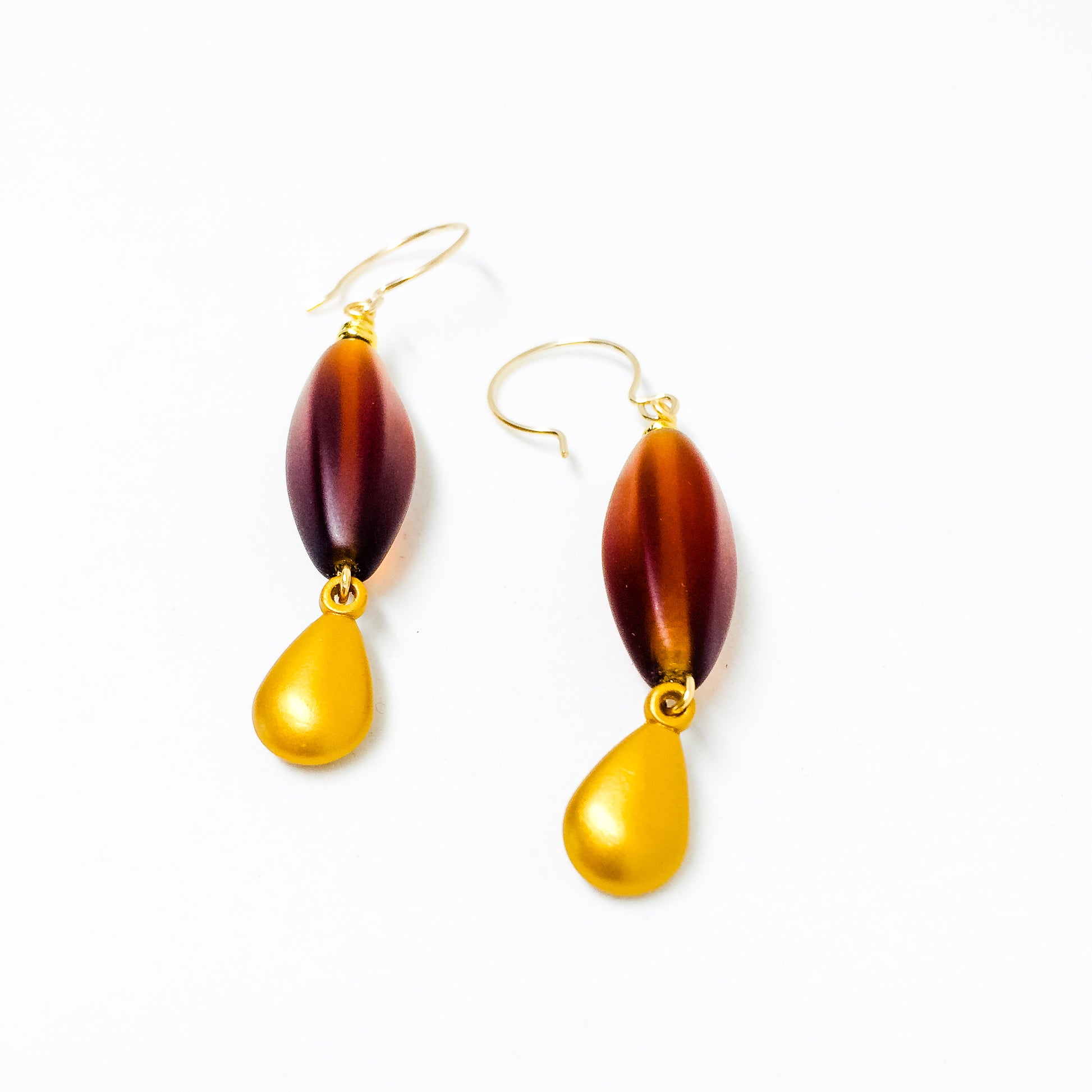 Amber frosted Czech glass bead drop earrings with gold charm