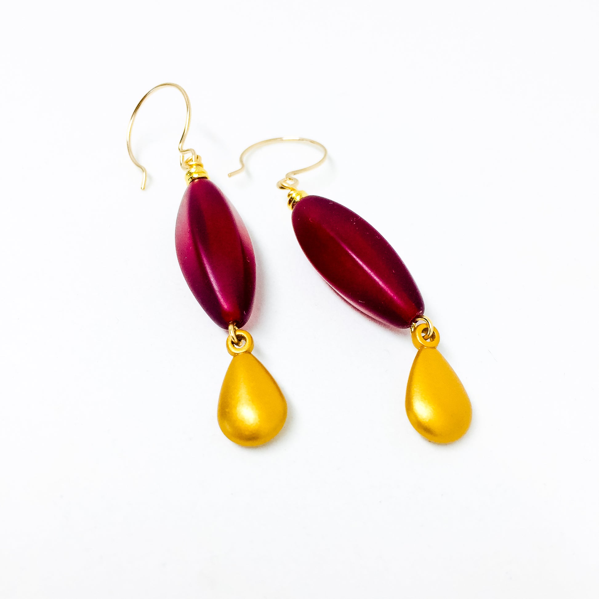Ruby frosted Czech glass bead drop earrings with gold charm
