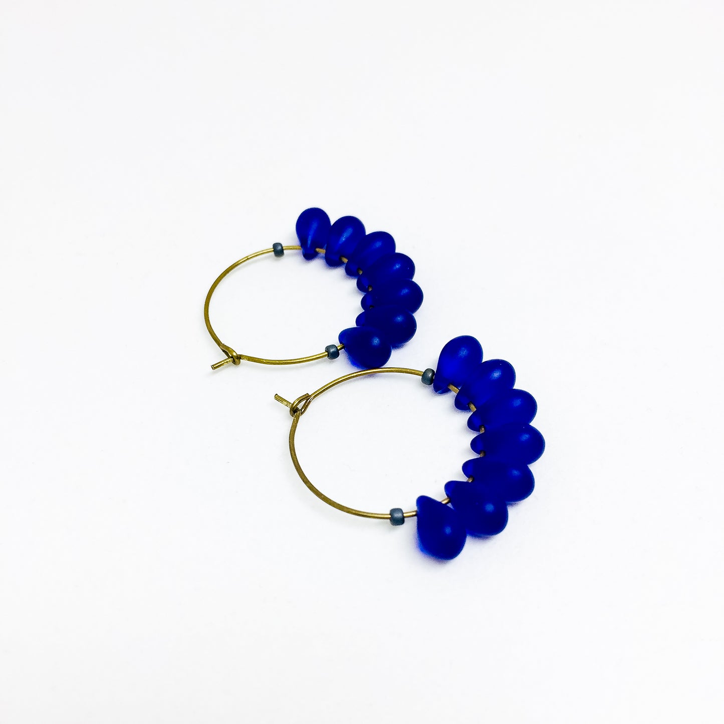 Dewdrop beaded glass hoop earrings in cobalt blue