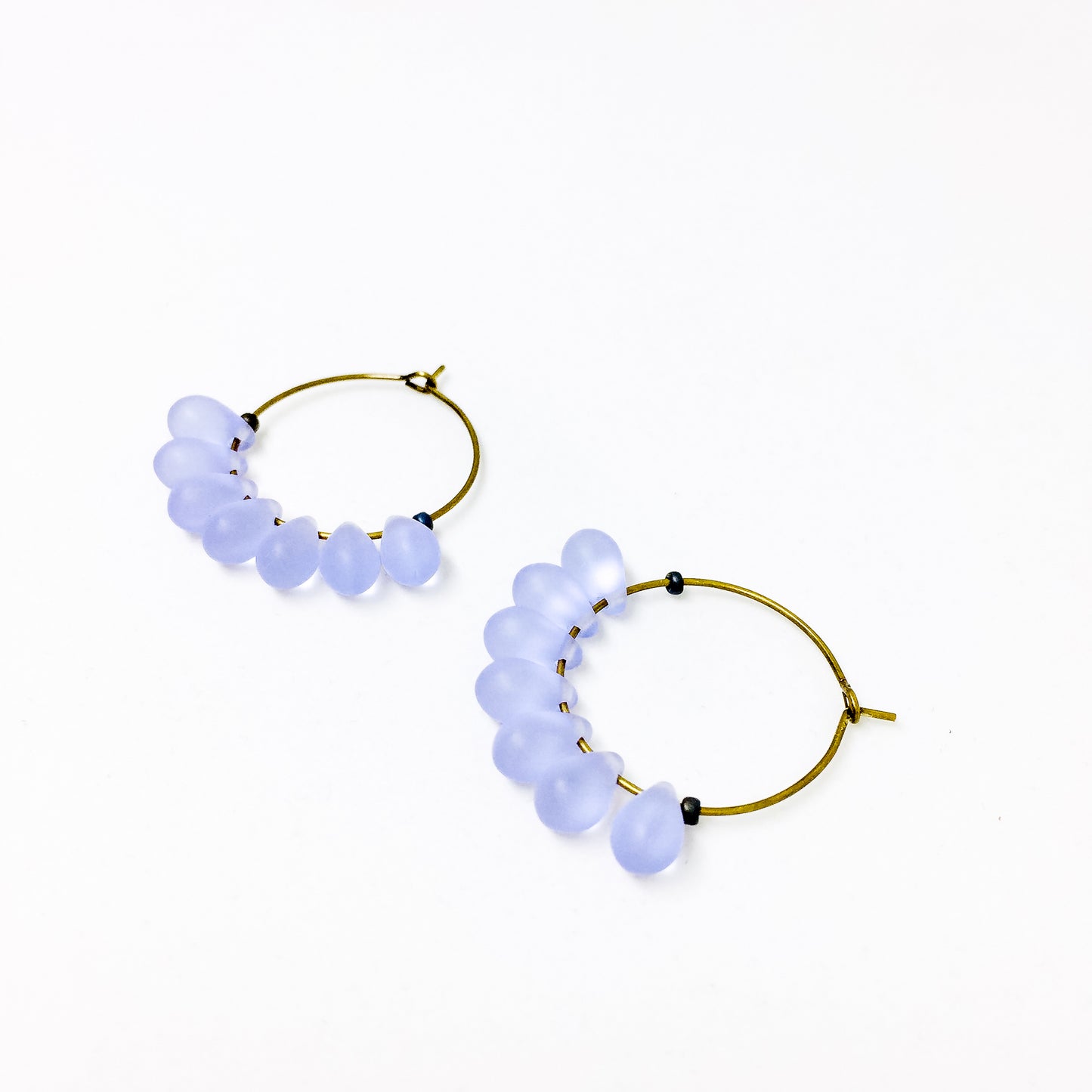 Dewdrop beaded glass hoop earrings in lilac