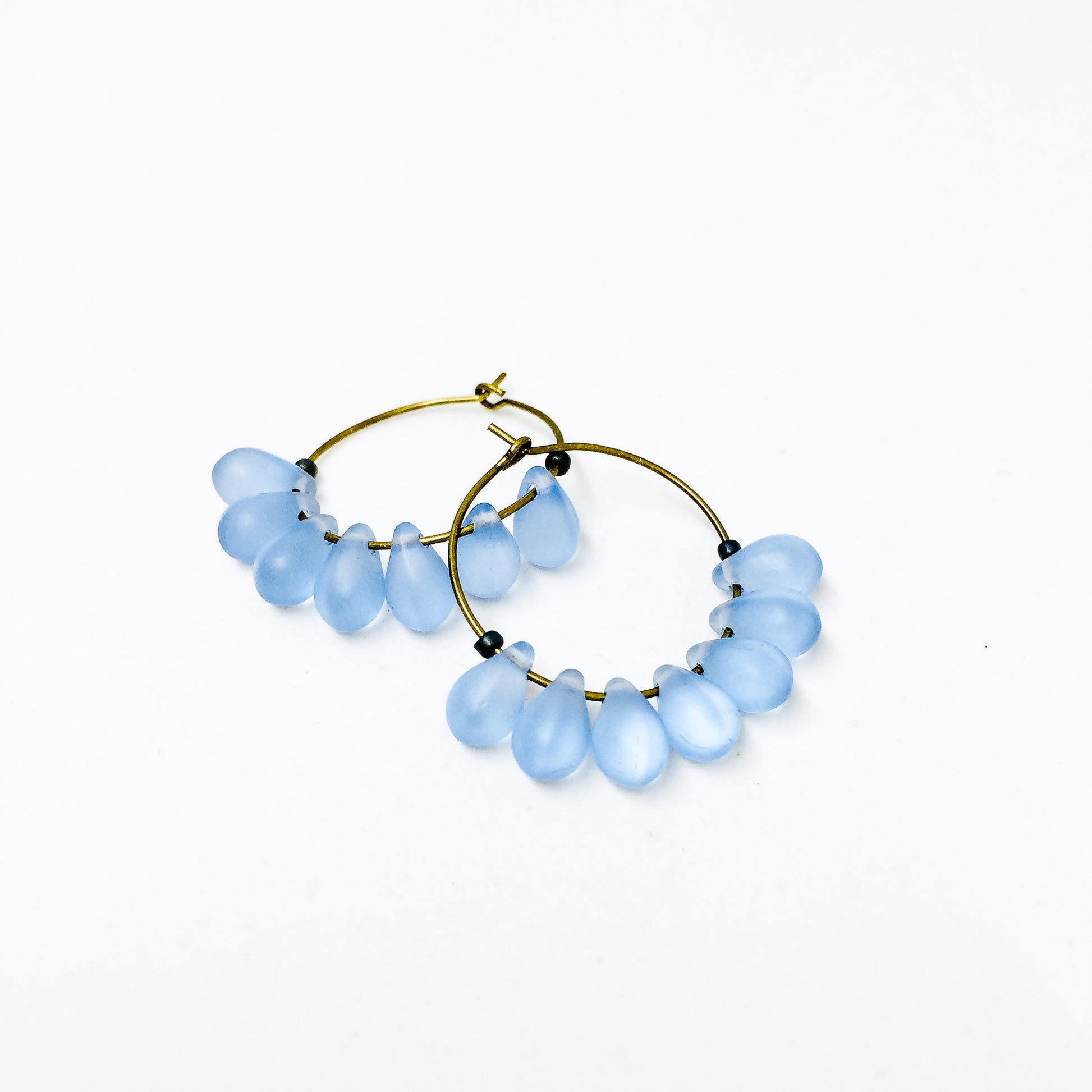Dewdrop beaded glass hoop earrings in sky blue